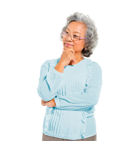 A woman standing with a questioning pose looking at the frequently asked questions