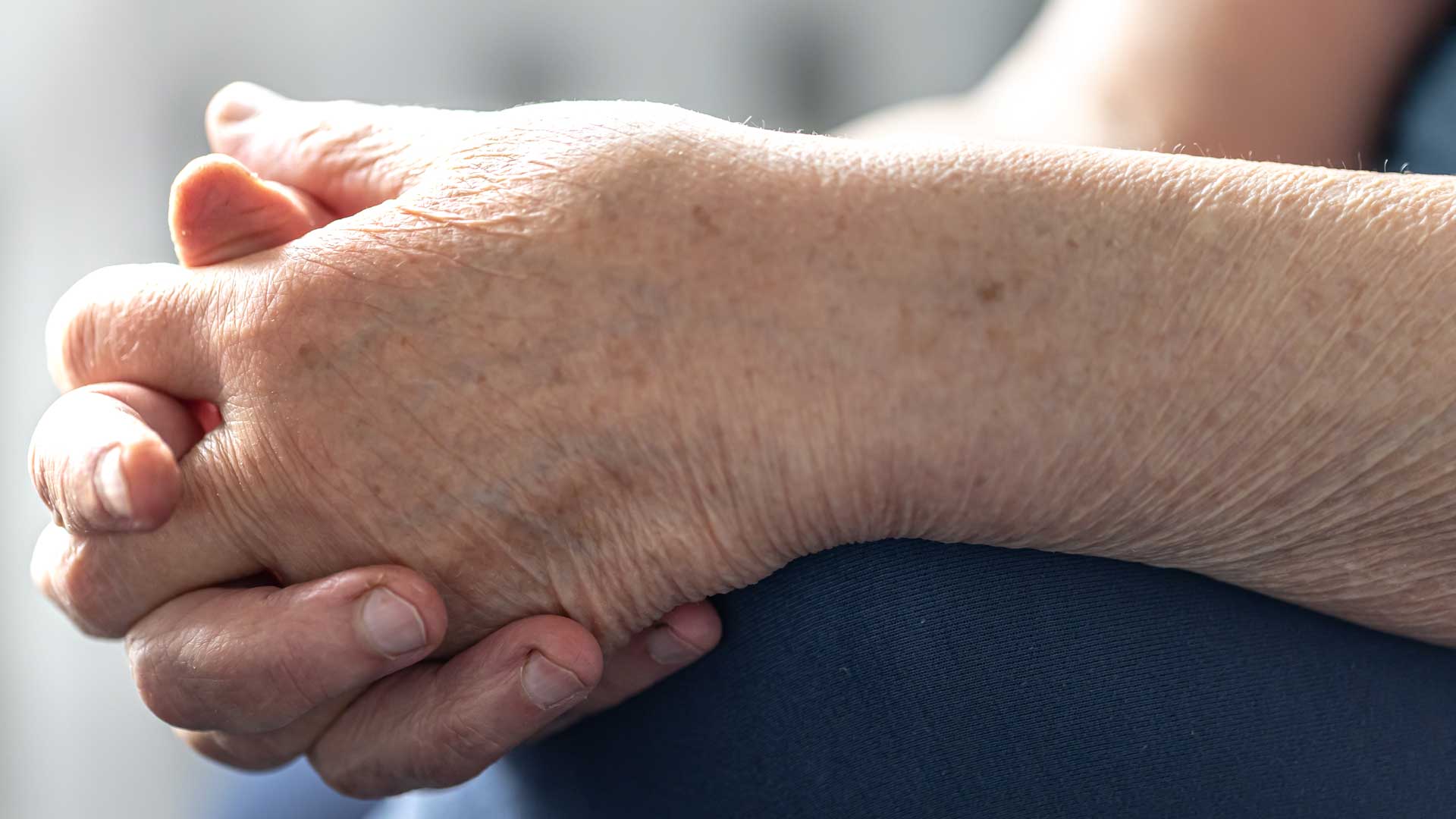 Hands of an elderly woman showing how skin ages over time